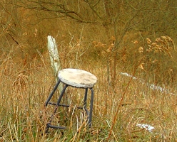 Metal-stool-on-hillside